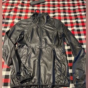 Half zip, light wind breaker, no liner, size4, black Excellent condition.
